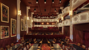 XYZ-Technologies_CafCon_Wide-view-from-the-stage-of-the-theatre-with-balconies-and-frames-illuminated-by-white-LED-lights