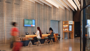 XYZ-Technologies_SANAAQ_Two-women-using-Ipads-at-the-centers-digital-counter
